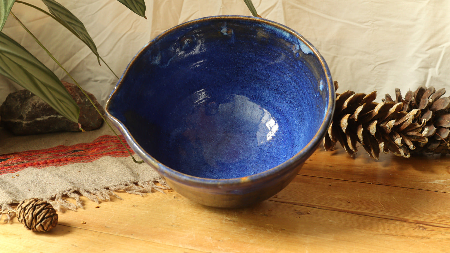 Nesting set of mixing bowls, blue glaze.
