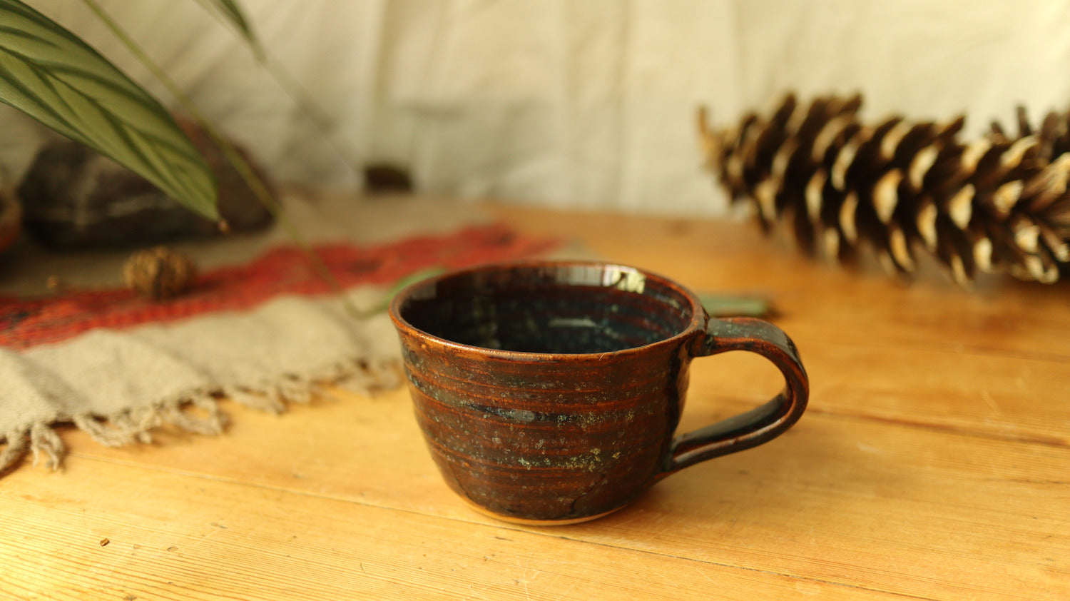 Wide mug, floating iron glaze