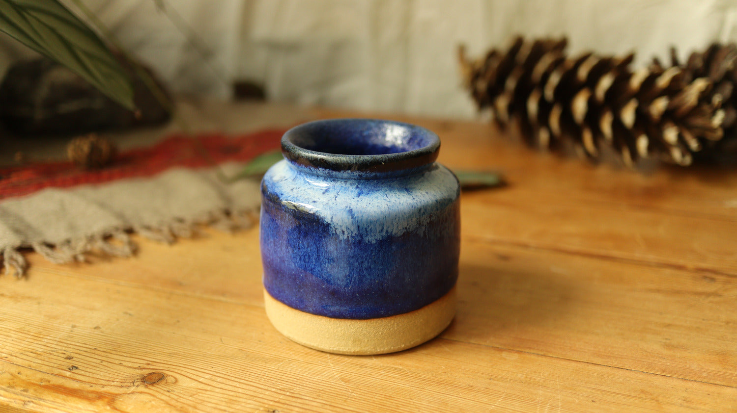 Straight sided jar, varigated blue glaze