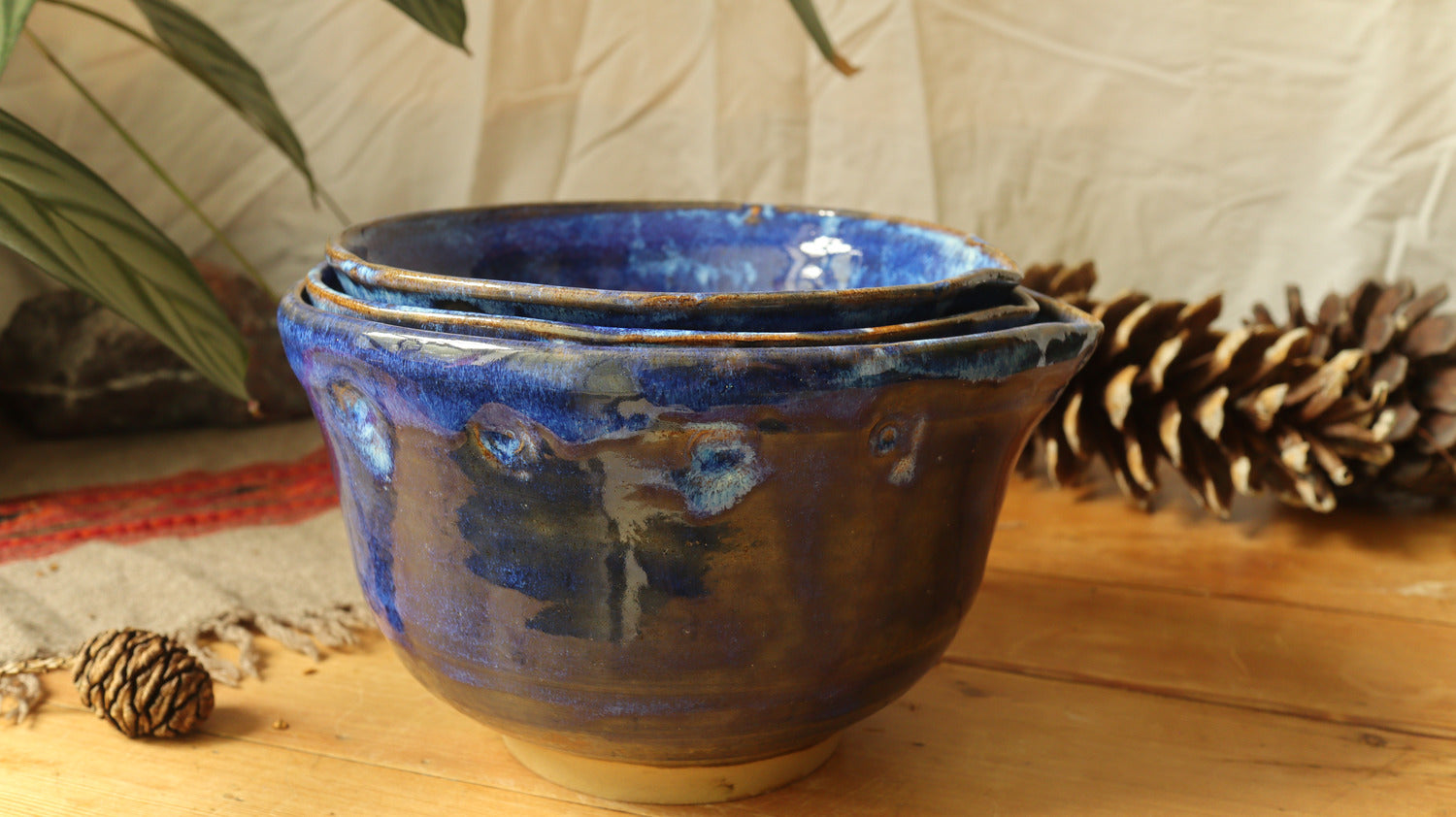 Nesting set of mixing bowls, blue glaze.