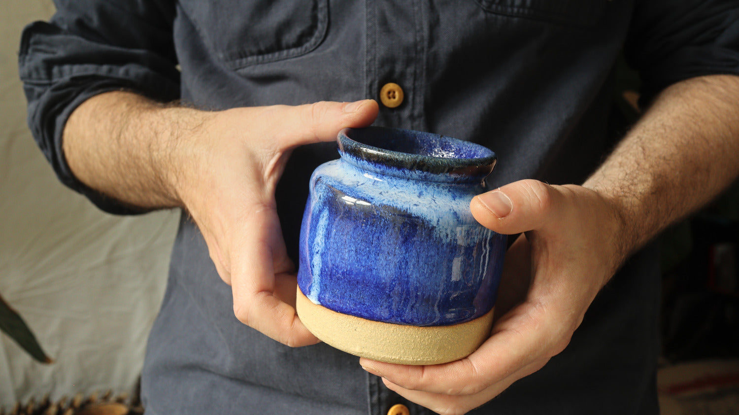 Straight sided jar, varigated blue glaze